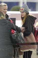 BELLA THORNE and Alex Martini at LAX Airport in Los Angeles 10/06/2019