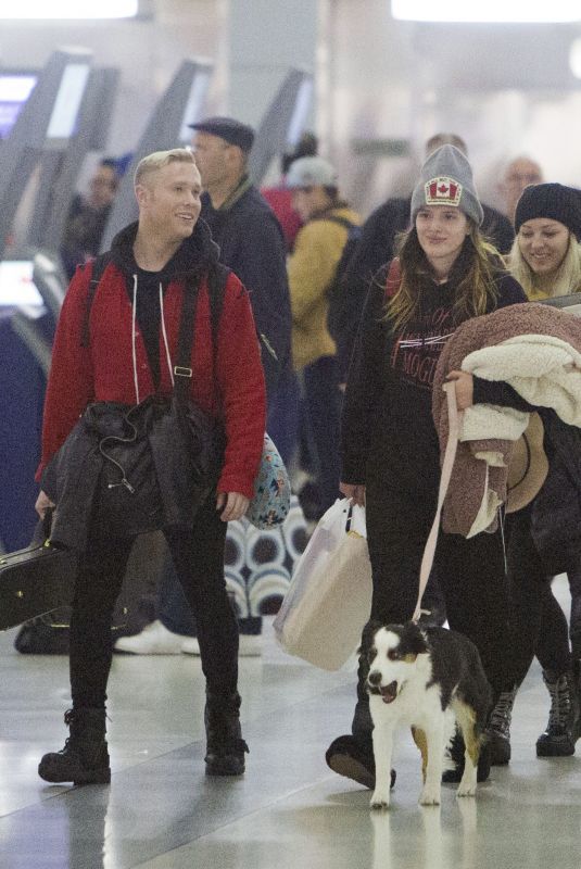 BELLA THORNE and Alex Martini at LAX Airport in Los Angeles 10/06/2019