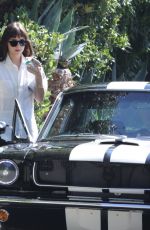 DAKOTA JOHNSON and Chris Martin Drive Out in a Vintage Shelby GT in Malibu 10/05/2019