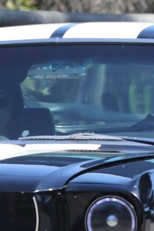 DAKOTA JOHNSON and Chris Martin Drive Out in a Vintage Shelby GT in Malibu 10/05/2019
