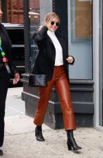 ELIZABETH OLSEN Aarrives at AOL Build in New York 10/08/2019