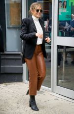 ELIZABETH OLSEN Aarrives at AOL Build in New York 10/08/2019