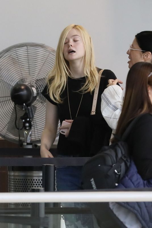 ELLE FANNING at Los Angeles International Airport 10/01/2019