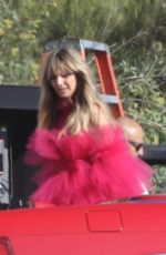 HEIDI KLUM at a Photoshoot on the Beach in Malibu 10/23/2019