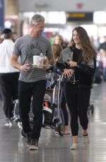 LANA DEL REY and Sean Larkin at JFK Airport in New York 10/25/2019