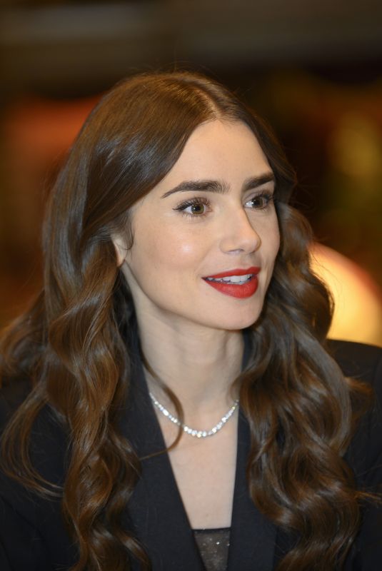 LILY COLLINS on the Set of Emily in Paris in Paris 09/27/2019