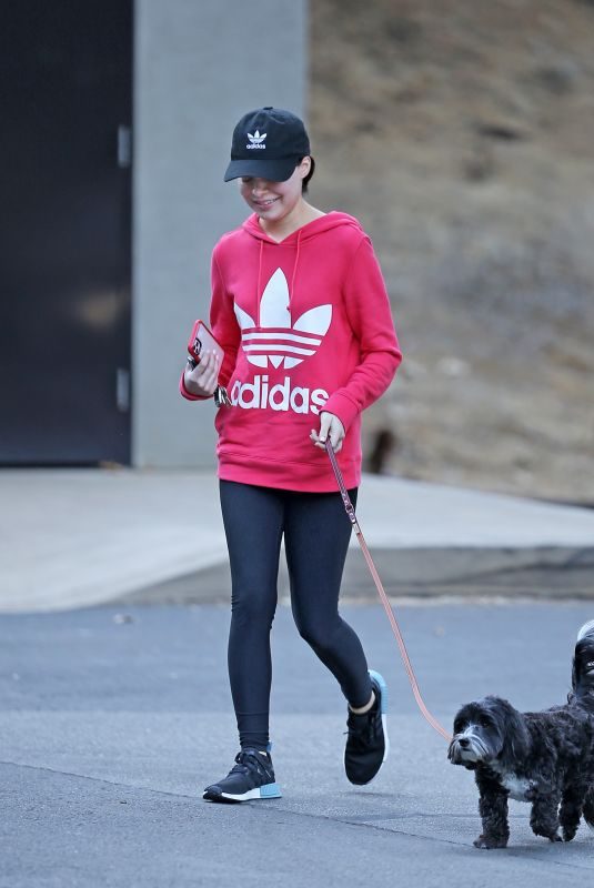 MIRANDA COSGROVE Out with Her Dog in Los Angeles 10/06/2019