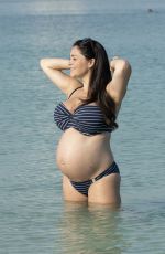Pregnant CASEY BATCHELOR in Bikini on the Beach in Dubai 10/15/2019