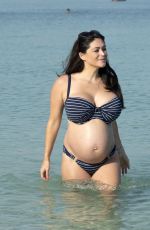 Pregnant CASEY BATCHELOR in Bikini on the Beach in Dubai 10/15/2019