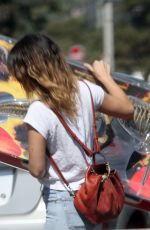 RACHEL BILSON Carries a Giant Dinosaur Model Out in Los Angeles 10/05/2019