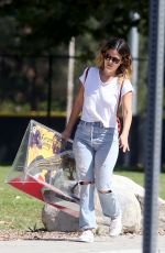 RACHEL BILSON Carries a Giant Dinosaur Model Out in Los Angeles 10/05/2019