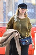 SIENNA MILLER in a Green Sweater Out in New York 10/23/2019