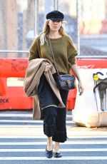 SIENNA MILLER in a Green Sweater Out in New York 10/23/2019
