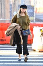SIENNA MILLER in a Green Sweater Out in New York 10/23/2019