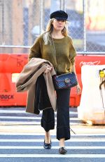 SIENNA MILLER in a Green Sweater Out in New York 10/23/2019