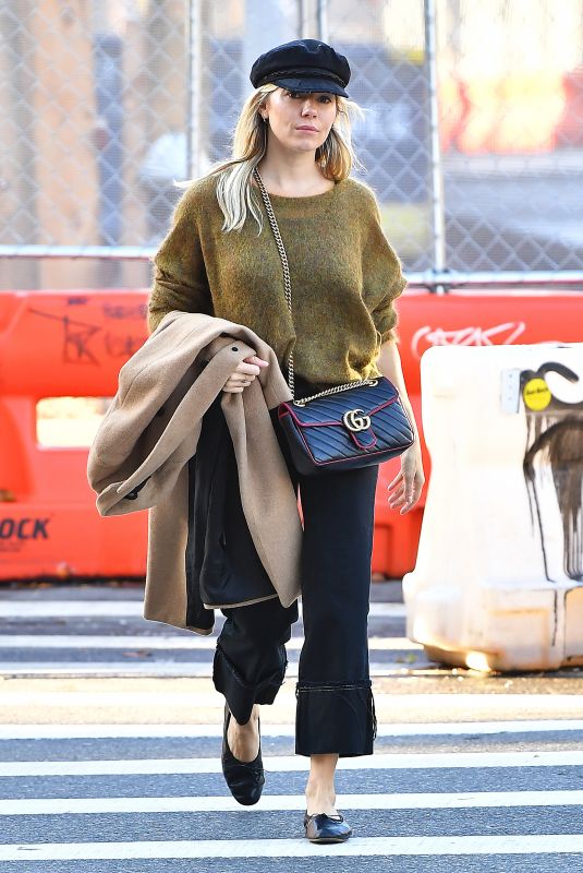 SIENNA MILLER in a Green Sweater Out in New York 10/23/2019