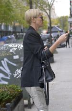 CHARLIZE THERON Leaves Her Hotel in New York 11/12/2019