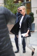 CHARLIZE THERON Leaves Her Hotel in New York 11/12/2019