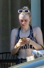 DAKOTA FANNING in Tights Leaves a Gym in Los Angeles 11/09/2019