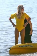 HAILEY BIEBER on the Set of a Photoshoot at a Beach in Miami 11/27/2019