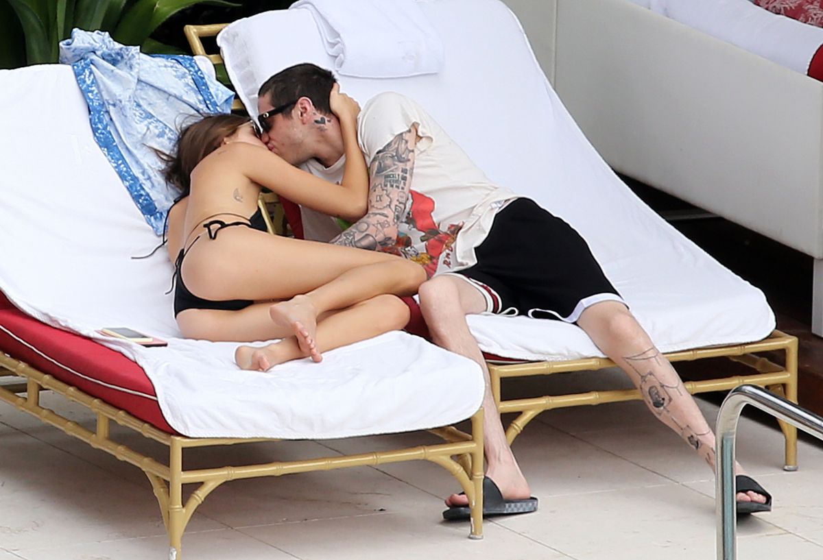 KAIA GERBER in Bikini and Pete Davidson at a Pool in Miami 11/23/2019.