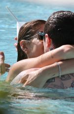 KAIA GERBER in Bikini and Pete Davidson at a Pool in Miami 11/23/2019