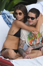 KAIA GERBER in Bikini and Pete Davidson at a Pool in Miami 11/23/2019