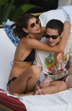 KAIA GERBER in Bikini and Pete Davidson at a Pool in Miami 11/23/2019