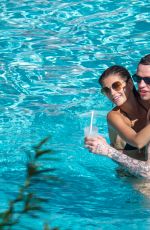 KAIA GERBER in Bikini and Pete Davidson at a Pool in Miami 11/23/2019