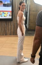 KATIE HOLMES Takes Donations at McDonald