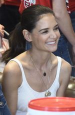 KATIE HOLMES Takes Donations at McDonald