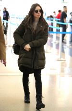 LILY COLLINS at LAX Airport in Los Angeles 11/21/2019