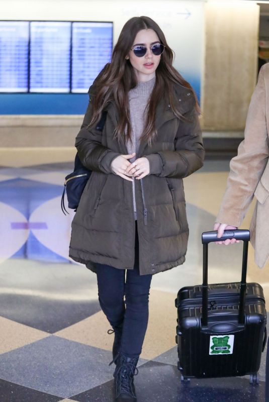 LILY COLLINS at LAX Airport in Los Angeles 11/21/2019