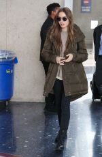LILY COLLINS at LAX Airport in Los Angeles 11/21/2019