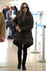 LILY COLLINS at LAX Airport in Los Angeles 11/21/2019