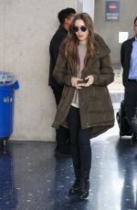 LILY COLLINS at LAX Airport in Los Angeles 11/21/2019