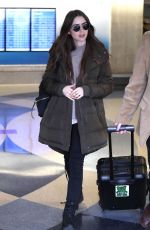 LILY COLLINS at LAX Airport in Los Angeles 11/21/2019