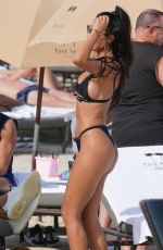 METISHA SCHAEFER in Bikini at a Beach in Miami 11/23/2019