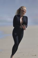 PAMELA ANDERSON Filming for Ultra Tune TV Ad at Gold Coast Beach 11/26/2019