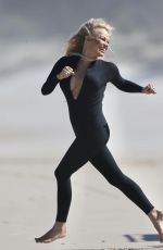 PAMELA ANDERSON Filming for Ultra Tune TV Ad at Gold Coast Beach 11/26/2019