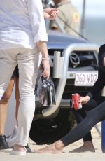 PAMELA ANDERSON Filming for Ultra Tune TV Ad at Gold Coast Beach 11/26/2019