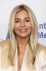 SIENNA MILLER at International Medical Corps
