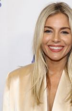 SIENNA MILLER at International Medical Corps