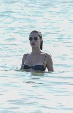 ALESSANDRA AMBROSIO in Black Bikini on the Beach in Florianopolis 12/29/2019