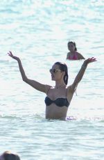 ALESSANDRA AMBROSIO in Black Bikini on the Beach in Florianopolis 12/29/2019