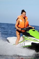 ALEXANDRA CANE in Bikini Riding a Jet Ski in Tenerife 12/27/2019