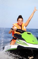 ALEXANDRA CANE in Bikini Riding a Jet Ski in Tenerife 12/27/2019