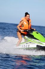ALEXANDRA CANE in Bikini Riding a Jet Ski in Tenerife 12/27/2019