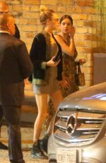 ASHLEY BENSON and CARA DELEVINGNE Out for Dinner in Rio De Janeiro 12/30/2019