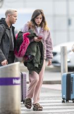 BELLA THORNE at Heathrow Airport in London 12/03/2019